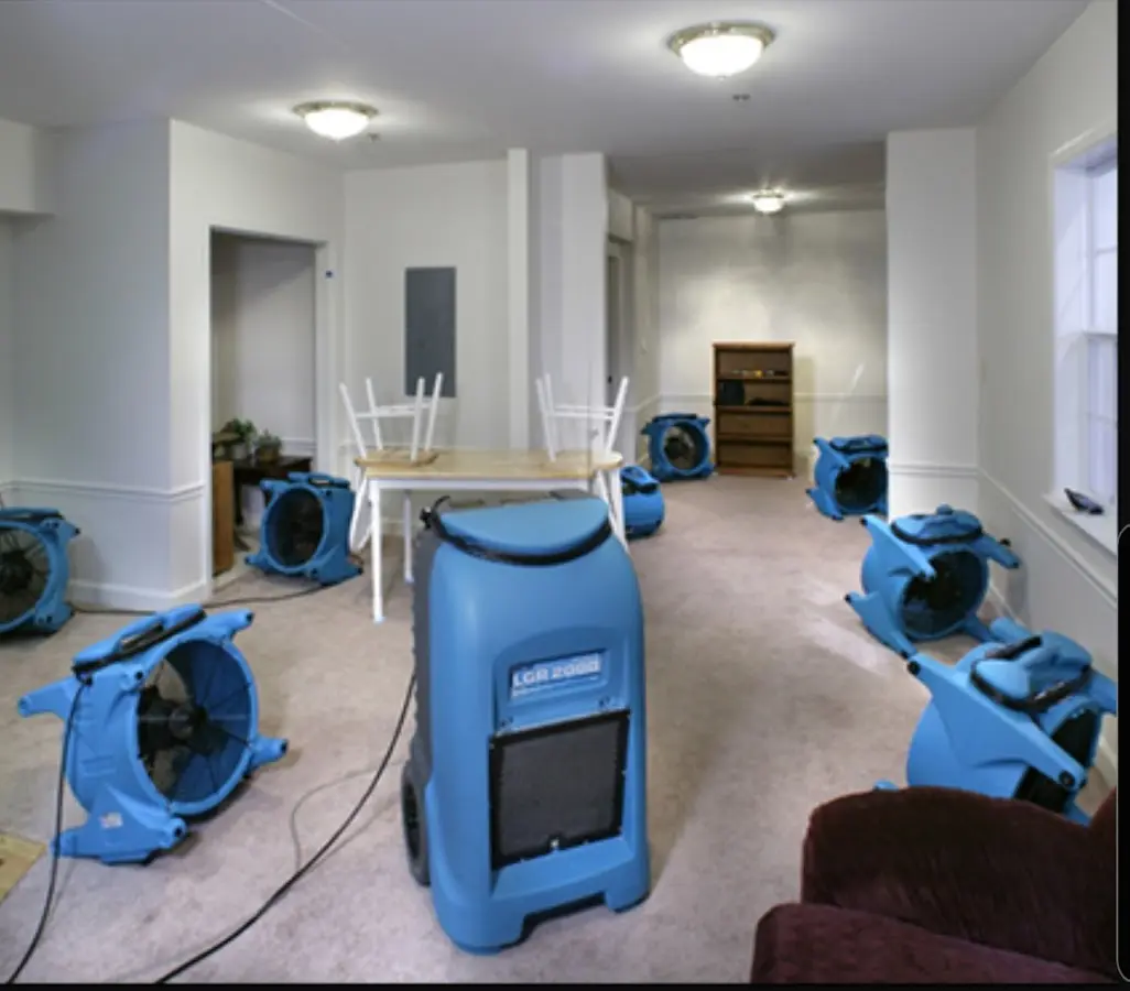 Air movers and dehumidifier setup for Water Damage Restoration in Beekmantown